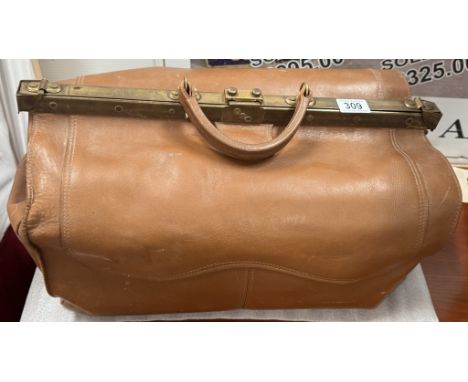 A vintage Gladstone bag