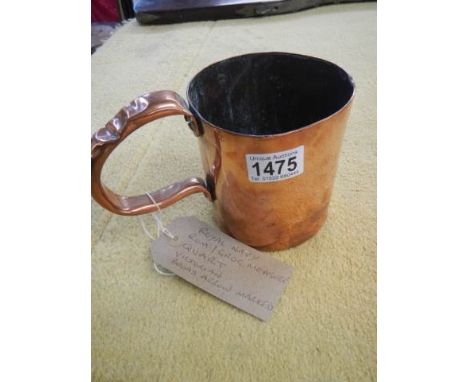 A Royal Navy one quart copper rum measure.Carries the broad arrow mark.