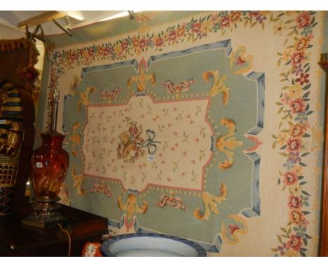 A tapestry wall hanging.&nbsp;