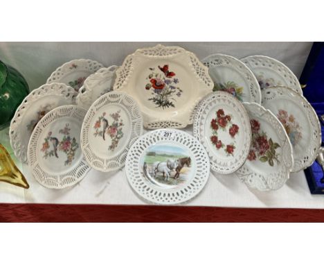 A quantity of vintage ribbon plates including creamware poppies plate
