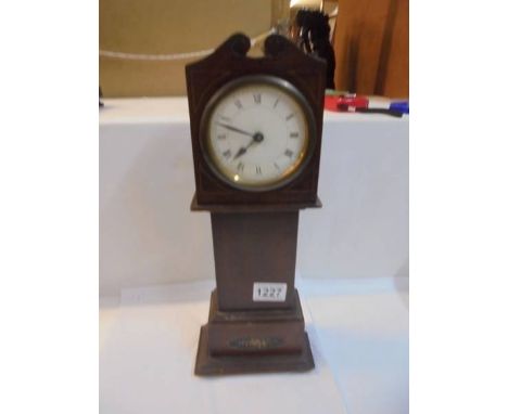 An Edwardian mahogany scale model of a Grandfather clock, 38.5 cm.