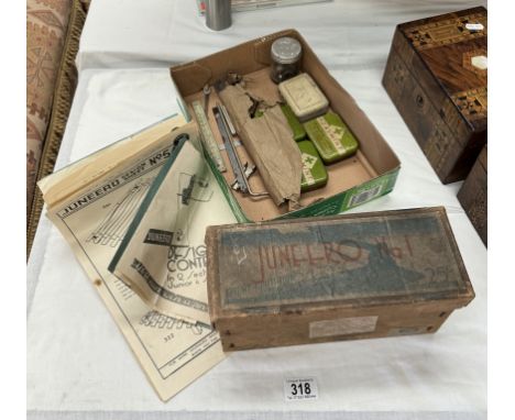 A boxed vintage Juneero No 1 multi purpose tool with parts &amp; design sheets