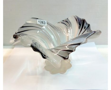 A large art glass bowl with pedestal base