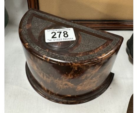 A vintage Bakelite desk tidy with spinning hidden section