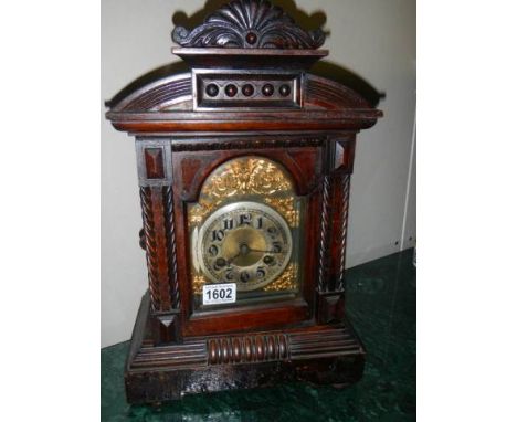 An oak mantel clock, complete and in working order.&nbsp;COLLECT ONLY