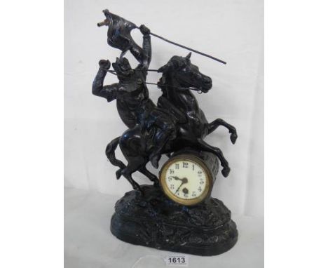 A tall French spelter mantel clock, 46 cm tall.&nbsp;COLLECT ONLY