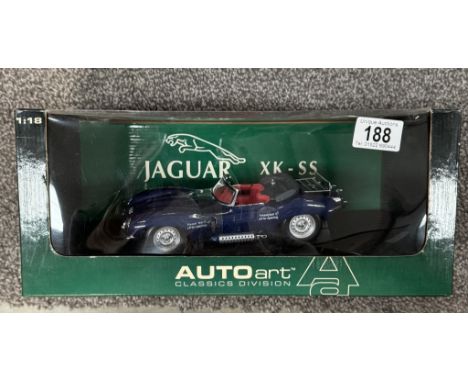An Auto Art 1/18 Jaguar XK-SS in blue.
