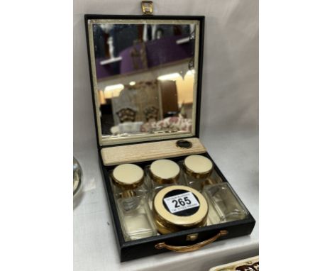 A vintage Sirram travelling set