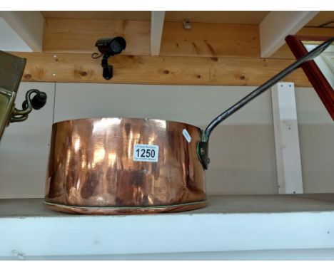 A large Victorian copper pan.