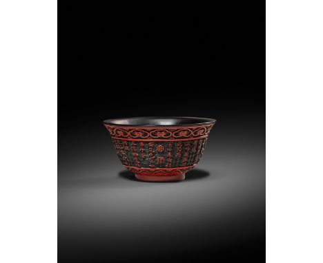 A RARE CHINESE IMPERIAL INSCRIBED TWO-COLOUR LACQUER TEA BOWL SIX CHARACTER QIANLONG MARK AND OF THE PERIOD 1736-95 The deep 