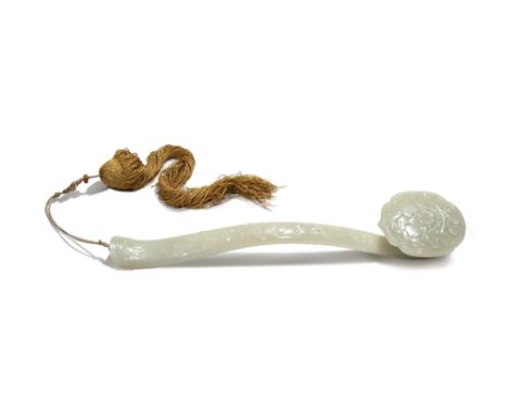 A CHINESE PALE CELADON JADE 'WUFU' RUYI SCEPTRE QING DYNASTY OR LATER The head carved in relief with peaches beneath a shou c