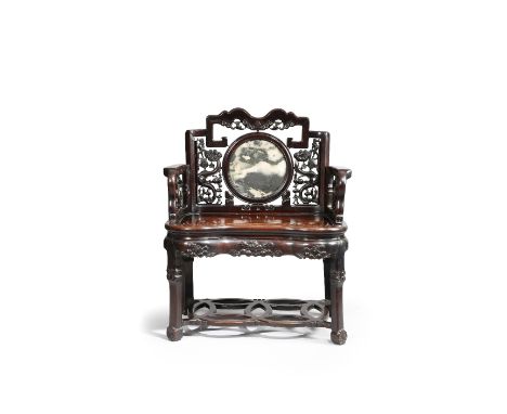 A LARGE CHINESE DREAMSTONE INSET HARDWOOD ARMCHAIR C.1900 The seat of ruyi outline, the backrest inset with a circular dreams