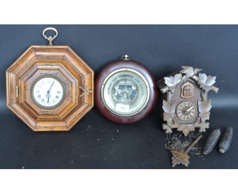 A vintage late 20th century Black Forest / German / Swiss mechanical 8 day Cuckoo clock. The clock having a Swiss Cottage sty