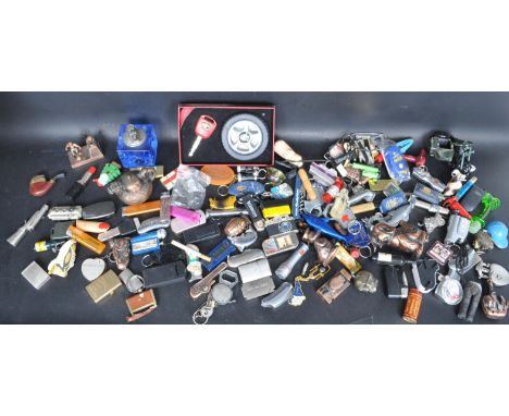 A large collection of vintage 20th century novelty lighters comprising of a Jalnd Elegance Series smoking Set, a motorcycle l