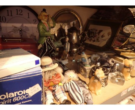 Shelf of mixed items including polaroid camera ( boxed ) wall clock DVD player metal ware pictures ornaments etc