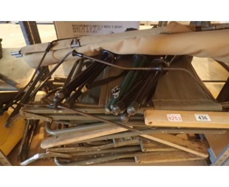 Five folding Army chairs three stools and an Army cot