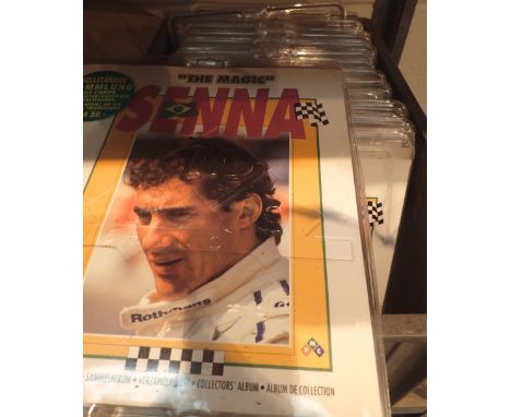 Fifteen sealed and new packs of collectors cards and album The Magic of Senna ( Ayrton Senna F1 driver )