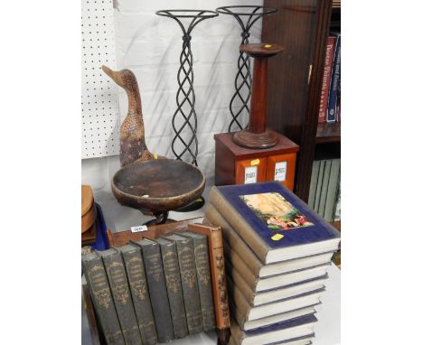 Books and accessories, an oak book trough, turned wooden bowl, duck ornament, two modern black finish candle stands,  photogr