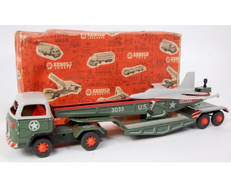 Arnold of Germany, tinplate and hand operate US Army No.3033 Aircraft Launcher, comprising of tinplate tractor unit finished 