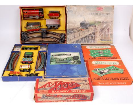 Large quantity of tinplate train sets, loose trains and accessories by Chad Valley, Brimtoy, Mettoy and others
