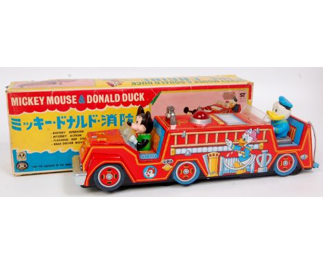 Modern Toys (Japan) Mickey Mouse and Donald Duck Fire Engine, large tinplate battery operated model finished in red, with det