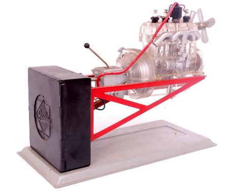 The Transparent Engine by Gescha, constructed model kit comprising of a four cylinder in-line engine with gearbox, mounted on