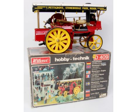 Wilesco D409 Showmans Engine, Live Steam, finished in red and black with corrugated canopy to read "T.Pettigrove, Stonebridge