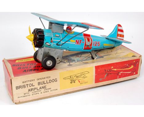 S and E (Japan) Bristol Bulldog Airplane, battery operated Monoplane finished in light blue, with detailed tin printing, regi