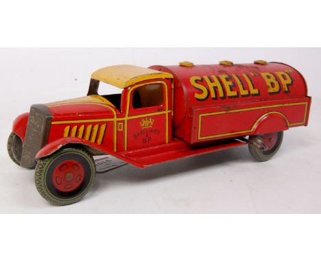 Wells (UK) large tinplate clockwork Shell BP petrol tanker, scarce pre-war example, in red with yellow roof and detailing, ba