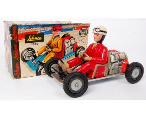 Schuco No.1055 "Go-Kart" comprising of red and grey lithographed engine detail with driver in red overalls with white crash h