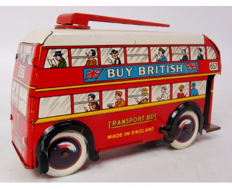 Wells Brimtoy large tinplate trolley bus, red with white roof and detailed tinprinted sides, with red trolley poles to roof, 