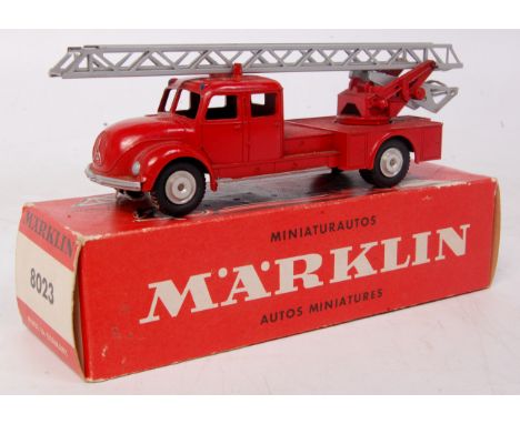Marklin, No. 8023, Marquis Fire Engine, red body with silver trim and ladders, cast spun hubs, in the original all card red b