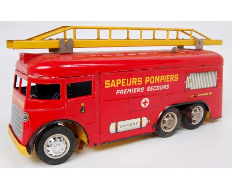 Joustra (France) large tinplate clockwork Fire Engine comprising of 6-wheeled clockwork model finished in red, fixed permanen
