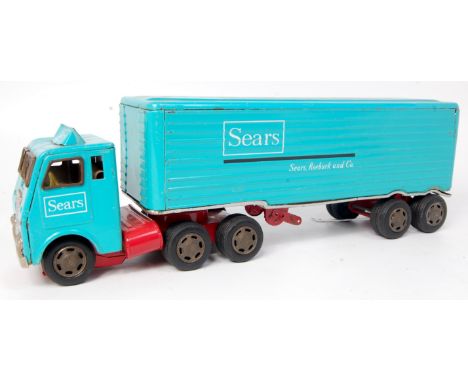 Japanese Tinplate "Sears Roebuck and Co" articulated lorry, comprising of light blue and yellow tractor unit, with light blue