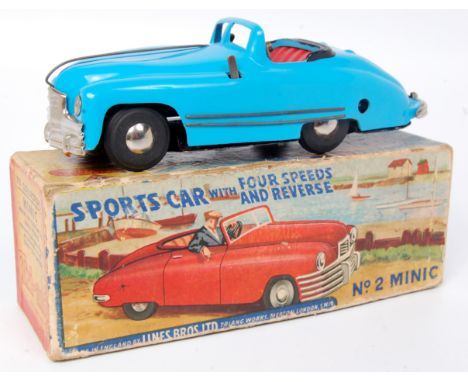 Triang Minic No.2 Sports Car fitted with 4-speed and reverse, light blue plastic body and red tinplate interior with plated p