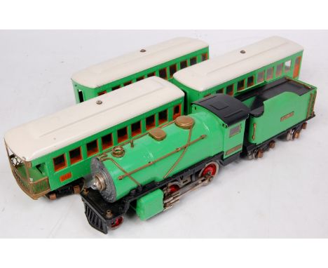 Lionel Trains 0 gauge American green 2-4-0 engine and tender No. 257 and 3 matching passenger cars (G)