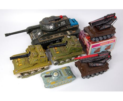 Collection of Japanese Tinplate Tanks and Military vehicles, to include 2 Modern Toys of Japan M-1 tanks, one is G-VG, the ot