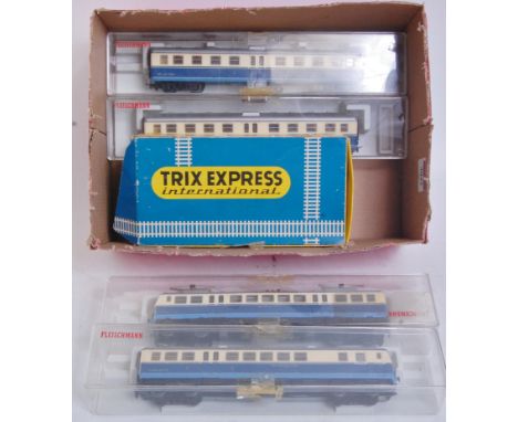 Kleinbahn 4 car electric H0 EMU 'Transalpin' blue/cream (G), SBB-FFS Swiss Co-Co electric locomotive (G) and a Trix Express D