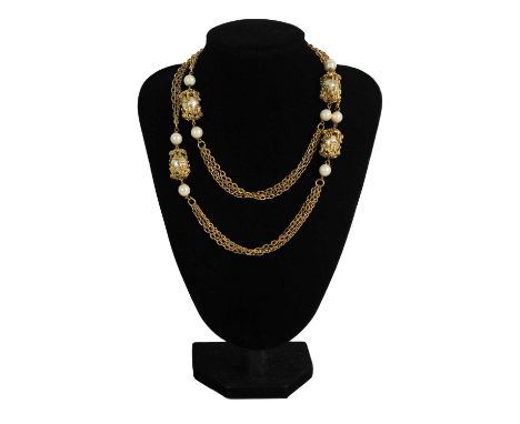 A Chanel gold-plated faux pearl sautoir neck chain, circa 1940's. Unsigned, length 97cm.
The estimated in-house shipping to a