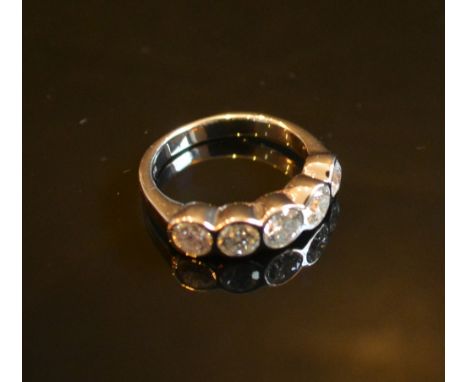 An 18ct. White Gold Five Stone Round Brilliant Cut Diamond Ring, approximately 1.55 ct.