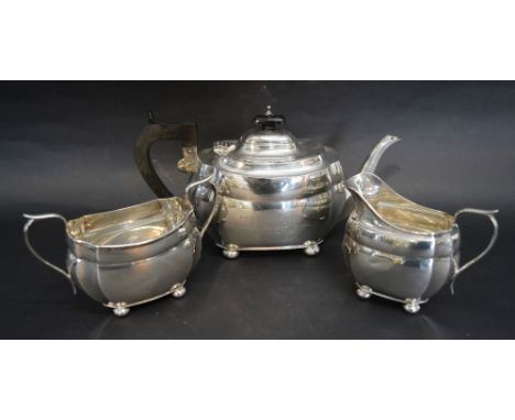 A Chester Silver Three Piece Tea Service comprising Teapot, Cream Jug and Two Handled Sucrier, 25 ozs. bearing inscription 'P