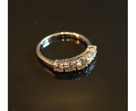 An 18ct. White Gold Five Stone Round Brilliant Cut Diamond Ring, approximately 1.04 ct. 