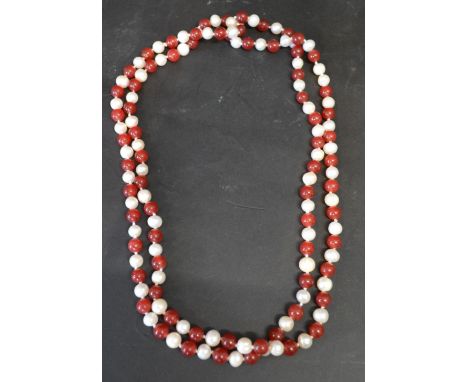 A Cultured Pearl and Garnet Long Bead Necklace