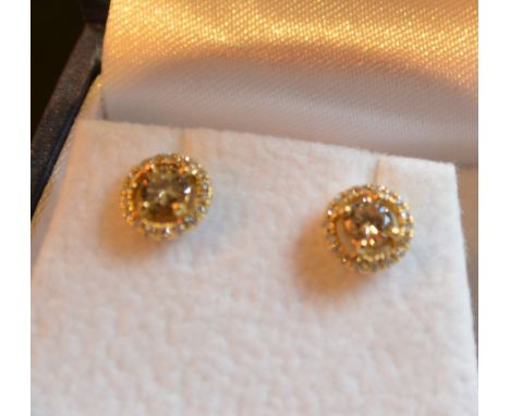 A Pair of 18ct. Yellow Gold Diamond Ear Studs