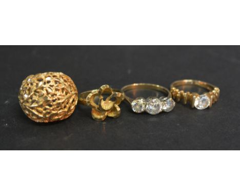 A 14ct. Gold Dress Ring together with three other similar gold dress rings, 13.7 gms.