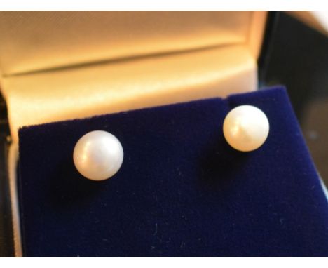 A Pair of 9ct. Yellow Gold and Cultured Pearl Stud Earrings