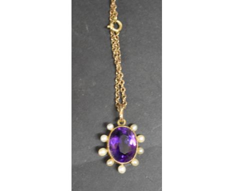 A Victorian Amethyst and Seed Pearl Pendant with 9ct. gold chain