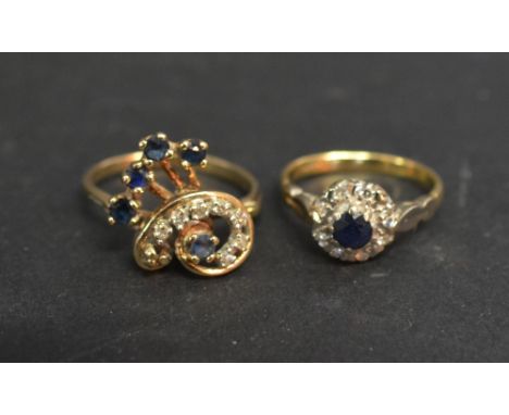 An 18ct. Gold Sapphire and Diamond Cluster Ring together with a 10ct. gold sapphire and diamond ring