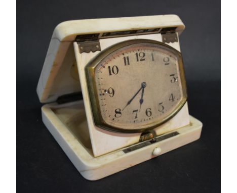 An Early 20th Century Travelling Clock, the movement by Brevet, fitted within an ivory case with silver hinges