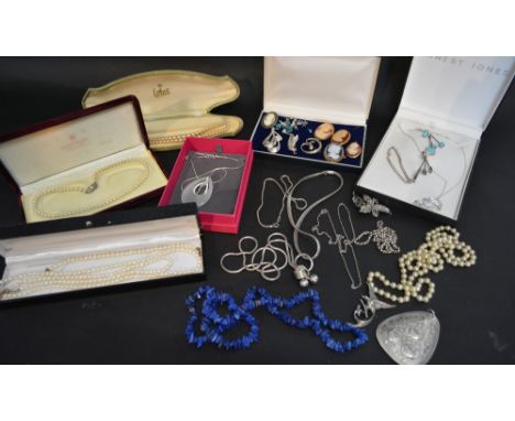 A Collection of Jewellery to include necklaces, cameo brooches, various simulated pearl necklaces and other items